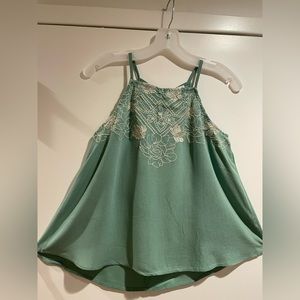 Seafoam Green halter top with embroidery detailing.